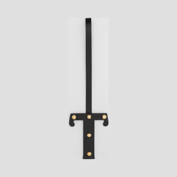 博百利/Burberry T 字母铆钉皮革吊饰 (黑色 / 浅金色) - 女士  80235371