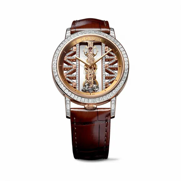 昆仑/Corum 43毫米金桥圆形腕表 系列 18Kt白金，水晶玻璃表壳中层，双面防眩水晶玻璃表镜，水晶玻璃表背，镶68颗长方多色蓝宝石，4.50克拉，15颗长方橄榄石，0.99克拉，8颗长方沙弗莱石，1.04克拉，5颗长方红宝石，0.65克拉 手动机械机芯 B113-03252–113.990.85-0F02GG85R