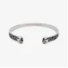 亚历山大麦昆/Alexander McQueen Twin Skull 手镯 男士 554578J160Y0446
