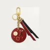 卡地亚/Cartier OG000646 Diabolo de Cartier封蜡章钥匙圈 红色和黑色小牛皮 镀金饰面 
