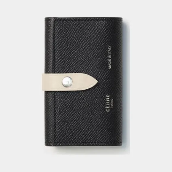 思琳/Celine  Strap黑色和本白色粒面小牛皮拼亮泽小牛皮钥匙包 105863AI5.38BJ