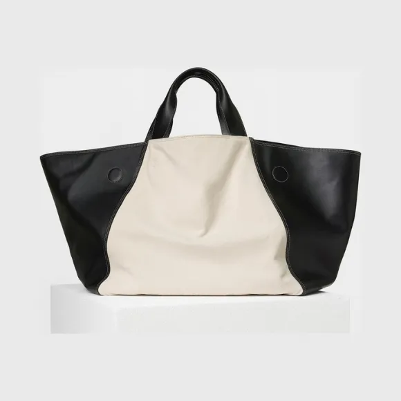 思琳/Celine  CanvasTote黑白双色光滑小牛皮和织物面料桶包 180362API.38AW