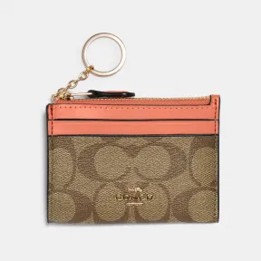 蔻驰/Coach 标志性帆布迷你紧身证件包 88208-IMVH0