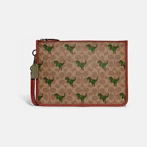 蔻驰/Coach 棕黄色+铁锈色 PVC 经典标志帆布REXY印花CHARTER手包 CF063-NU3