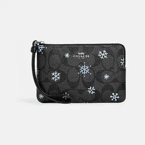 蔻驰/Coach 经典标志雪花印花角拉链腕包 CF286-SVV2W