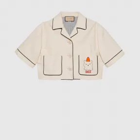 古驰/Gucci 配有动物贴片的油画布上装 737775-XDCFE-9101